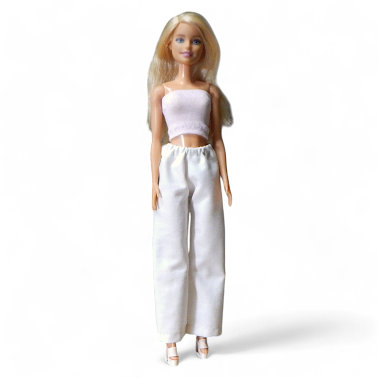 Bő fehér vászonnadrág barbie babákhoz előlnézet, fehér háttér
